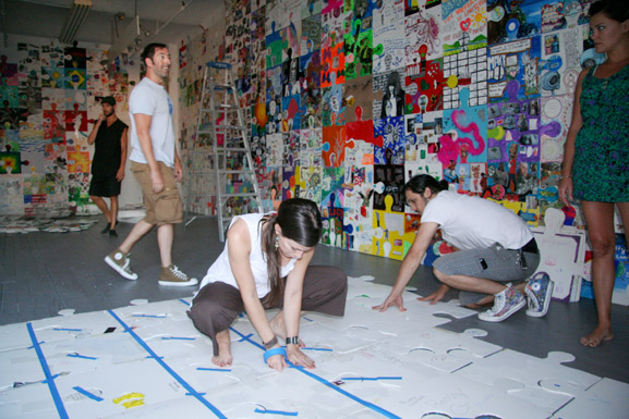 spattered columns art space puzzle installation & collaborative project art connects new york soho tim kelly artist nyc