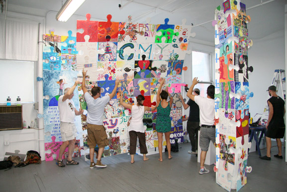 spattered columns art space puzzle installation & collaborative project art connects new york soho tim kelly artist nyc