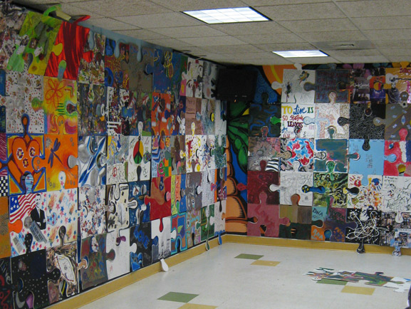 puzzle installation and collaborate project tim kelly artist puzzle art project surftaco